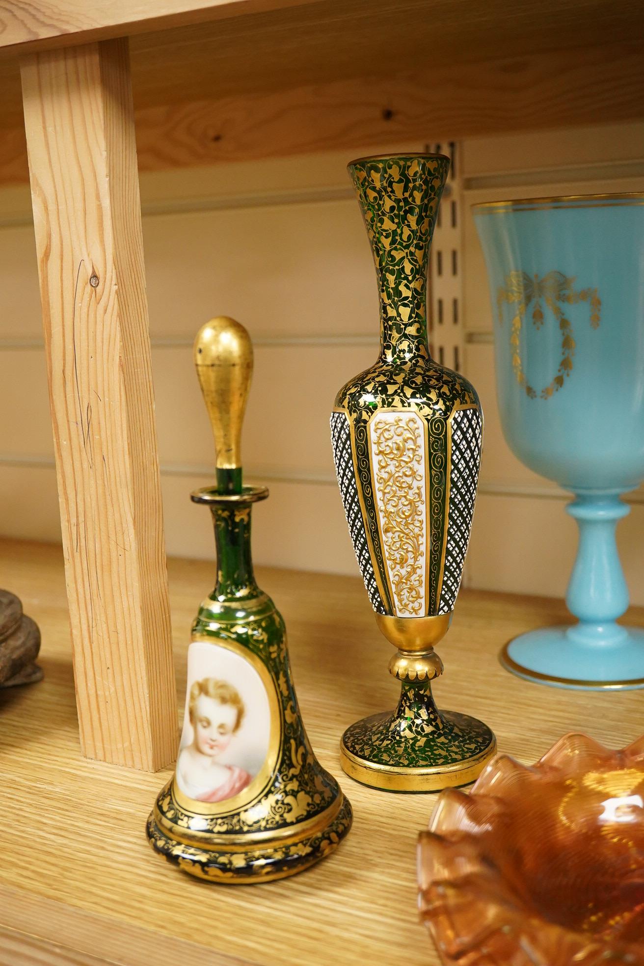 A Victorian gilt and enamelled green glass decanter, a similar vase, a small square decanter, Venetian dishes, silver plated coasters, etc